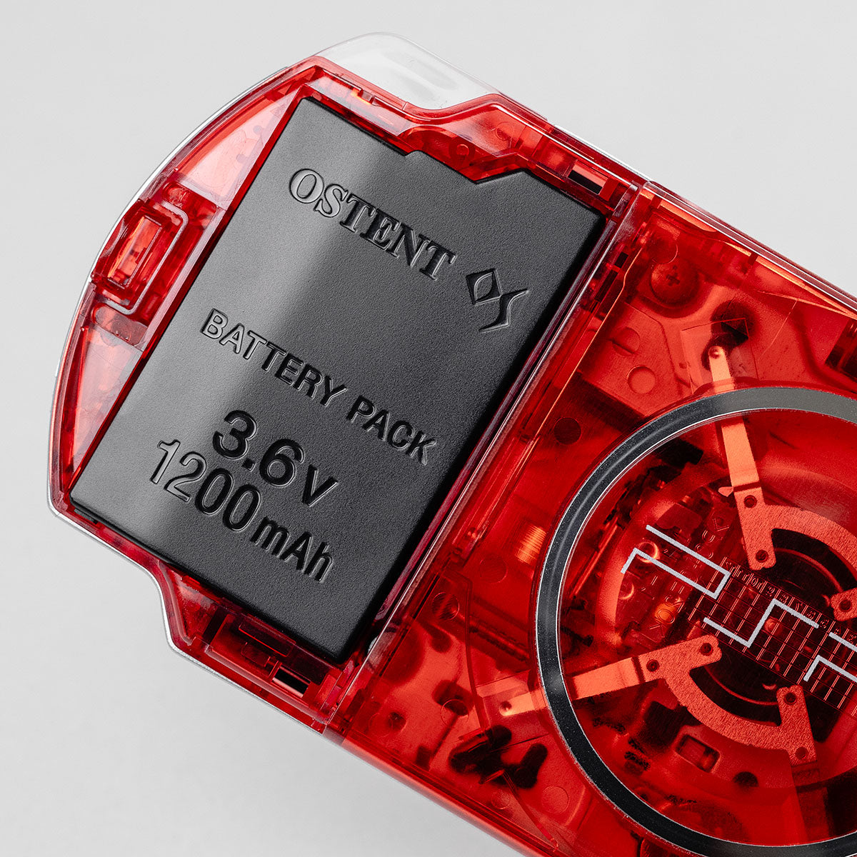 OSTENT 3.6V 1200mAh battery pack installed in custom transparent red Sony PSP 3000 back shell"