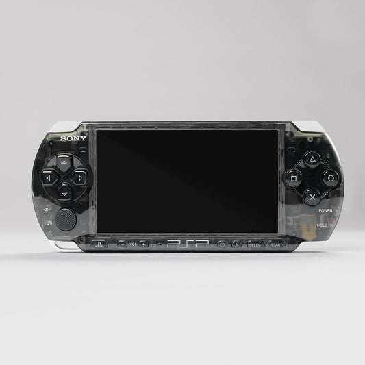 Front view of a Sony PSP handheld console with a custom black transparent shell and black buttons in a sleek, modded design