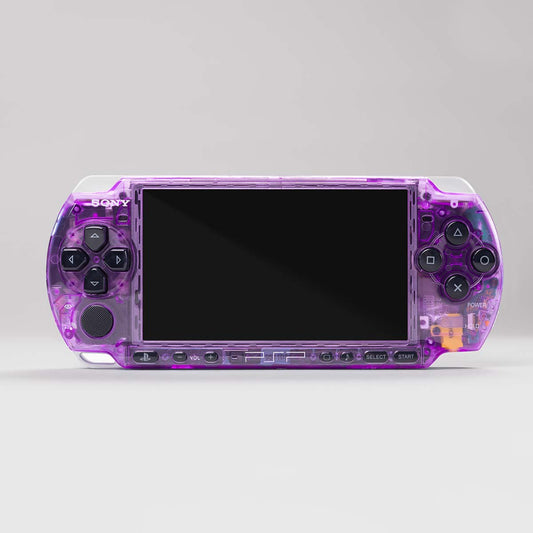 Front view of a custom Sony PSP with a purple transparent shell and black buttons, showcasing a sleek and modded handheld console